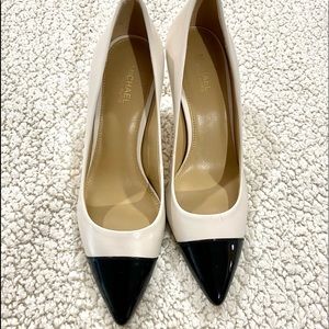 Michael Kors ivory and black pump.